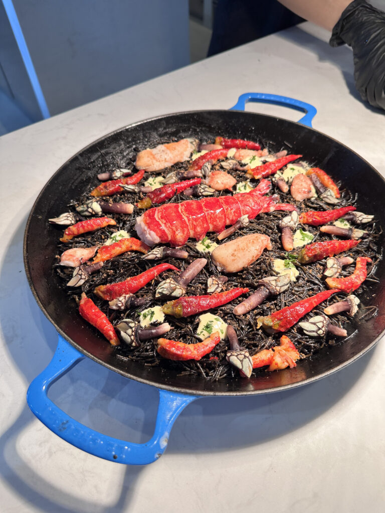 Black Ink Fideuà with Spanish Blue Lobster, Camarón Rojo and Goose Barnacle at SÓPA Spanish restaurant Bangkok